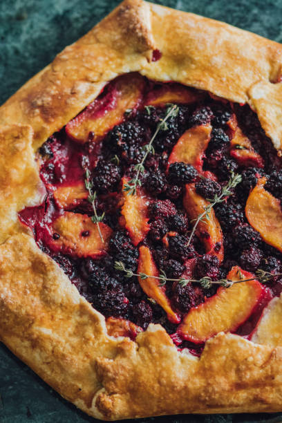 istock homemade blackberry peach and thyme galette 1466524249