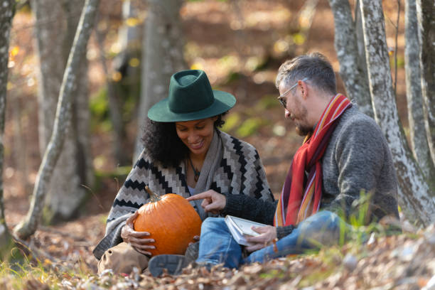 istock Couple sitting in nature. 1466527639