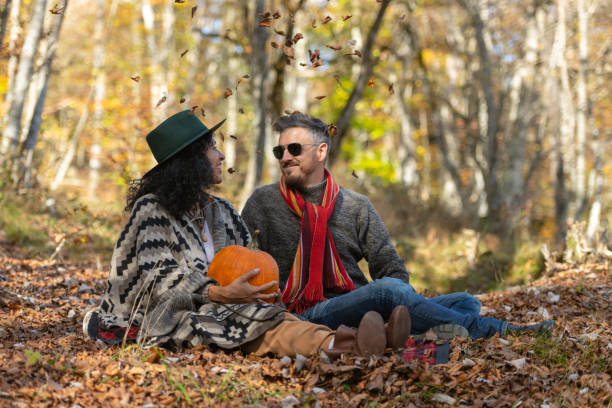 istock Couple sitting in nature. 1466527643