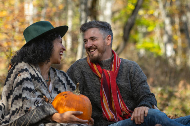 istock Couple sitting in nature. 1466527644