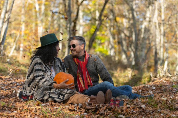 istock Couple sitting in nature. 1466527645