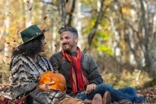 istock Couple sitting in nature. 1466527648