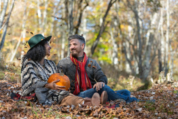 istock Couple sitting in nature. 1466527655