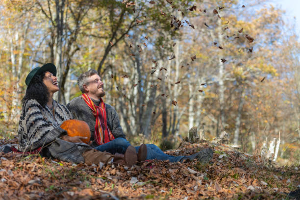 istock Couple sitting in nature. 1466527657