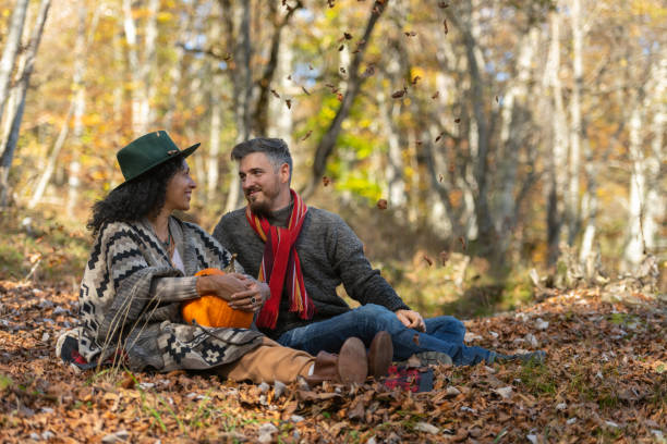 istock Couple sitting in nature. 1466527666