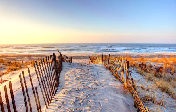 Ponquogue Beach in the Hamptons Ponquogue Beach is a stretch of sand accessed by a bridge across Shinnecock Bay. the hamptons stock pictures, royalty-free photos & images