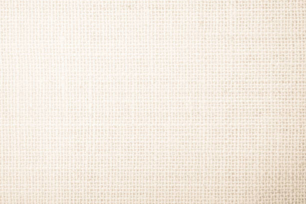 istock Jute hessian sackcloth burlap canvas woven texture background pattern in light beige cream brown color blank. Natural weaving fiber linen and cotton cloth texture as clean empty for decoration. 1466528563