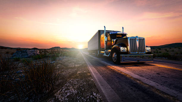 istock American style truck on freeway pulling load. Transportation theme. 3D illustration 1466537974