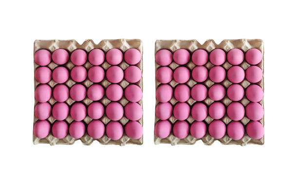 Century eggs or pickled eggs in recycled cardboard boxes isolated on white background.