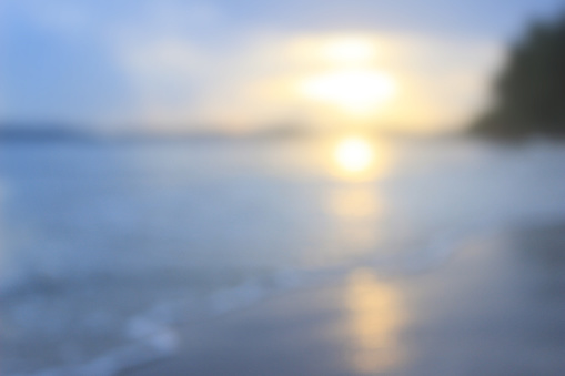 beach at sunset blur background