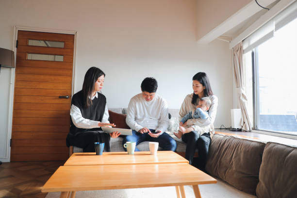 istock Young Family Signing a digital tablet 1466554485