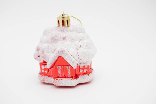 Christmas decoration toy snow-covered house.