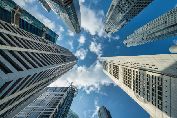 Singapore, city skyline looking up under skyscraper building business district