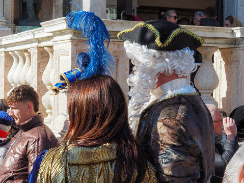 Venice, Italy - 13th february 2023 Carnival time and masked people gather in costume in Piazza San Marco area, Venezia.