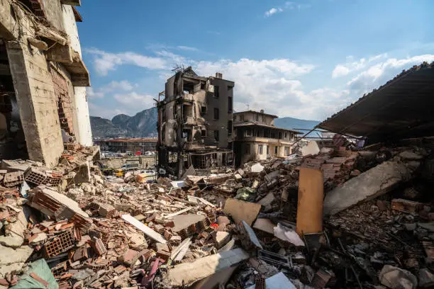 Photo of The wreckage of a collapsed building after the earthquake