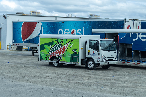 Indianapolis, Indiana, USA-09/28/2022: Pepsi distribution center. Pepsi truck and trailers