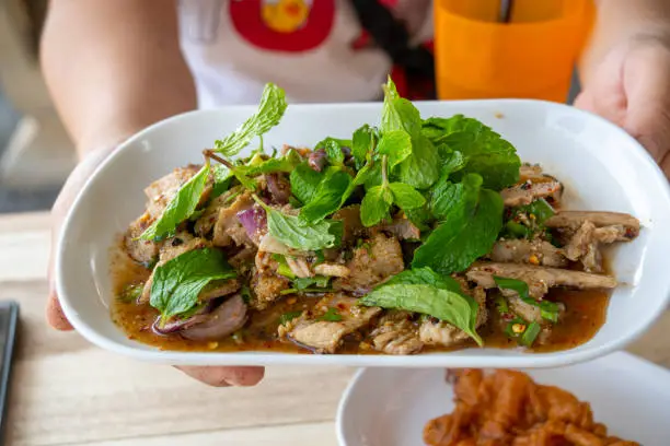 Photo of Spicy Grilled Pork Salad (Moo Yang Nam Tok)