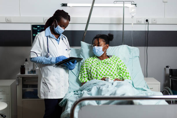 istock African american medic checking disease treatment 1466578923