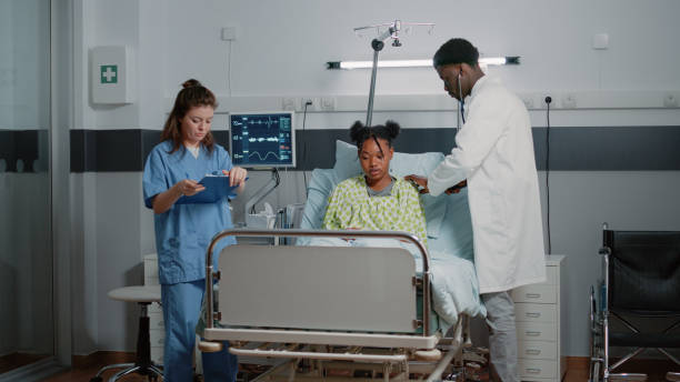 istock Specialist using stethoscope to examine heartbeat and pulse 1466580347