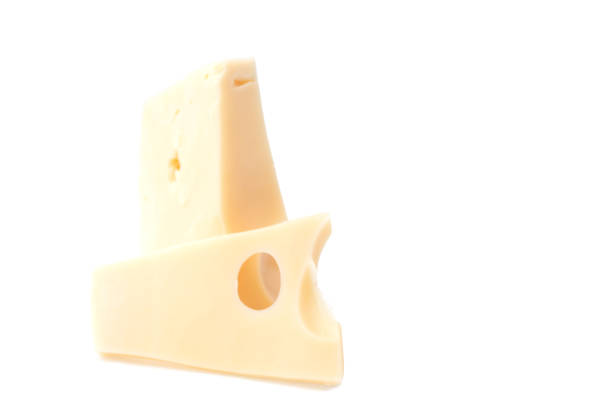 istock Pieces of cheese with holes on a white background 1466581224