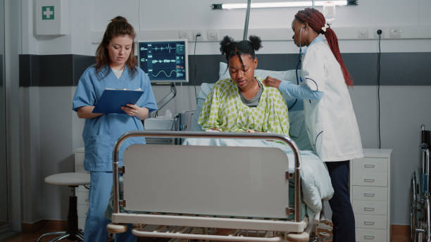 istock Woman working as medic doing consultation with stethoscope 1466581833
