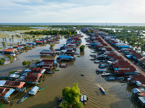 Cambodia Kampong Phluk (Harbor of the Tusks) Floating Village Aerial Drone Point of View. Famous Stilt Houses and Fishing Farms of Kampong Phluk - the well known Floating Village near Siem Reap and Lake Tonle Sap - situated at the watered rural rice fields. Kampong Phluk Floating Village, Siem Reap Province, Prasat Bakong, Cambodia, South East Asia, Asia.