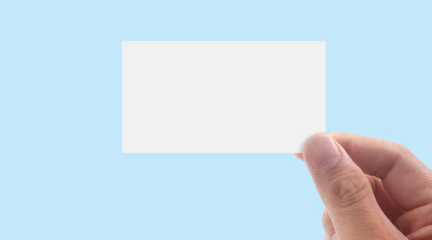 istock Close up of hand holding virtual card 1466592465