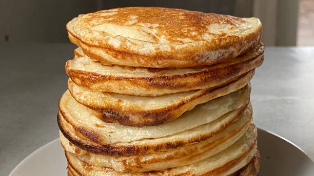 istock Image of fresh ruddy pancakes with honey 1466593022