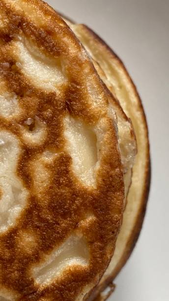 istock Image of fresh ruddy pancakes with honey 1466593054