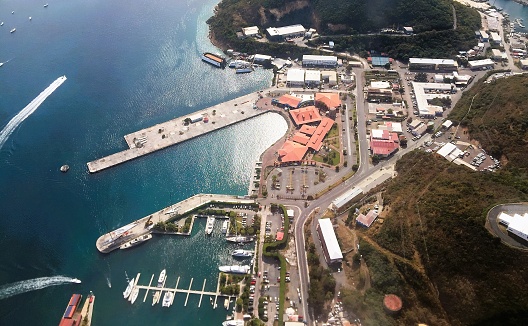 Simpson Bay, St. Maarten-December 22, 2009: The drawbridge at Simpson Bay is down to allow autos to continue traveling along the coast on this small Caribbean island.