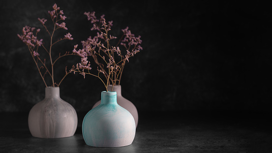 summer purple wild flowers in vase on white backgrround