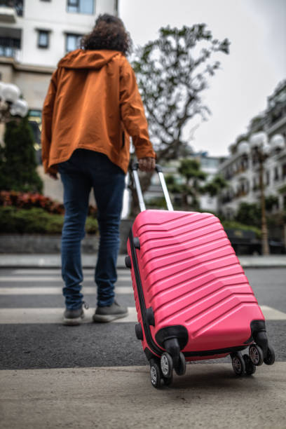 istock Tourist walking around with luggage 1466602998