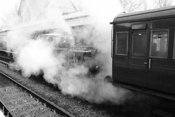 istock Steam covering a Victorian steam engine at a Victorian station. 1466612307