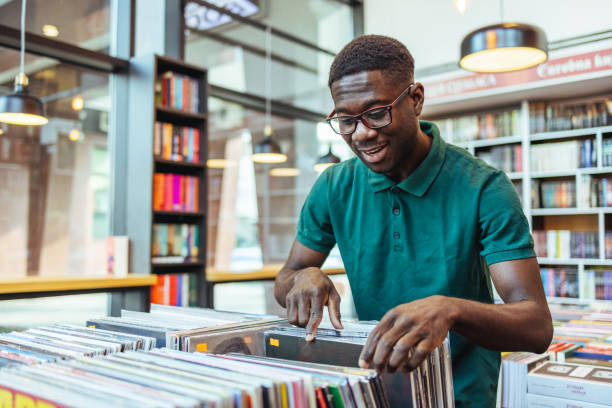 istock Man Shopping in a Vinyl Record Store 1466614163