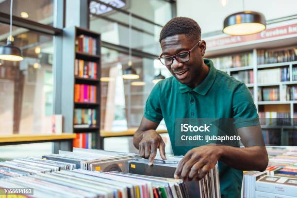 Man Shopping In A Vinyl Record Store Stock Photo - Download Image Now - Record - Analog Audio, Men, Shopping