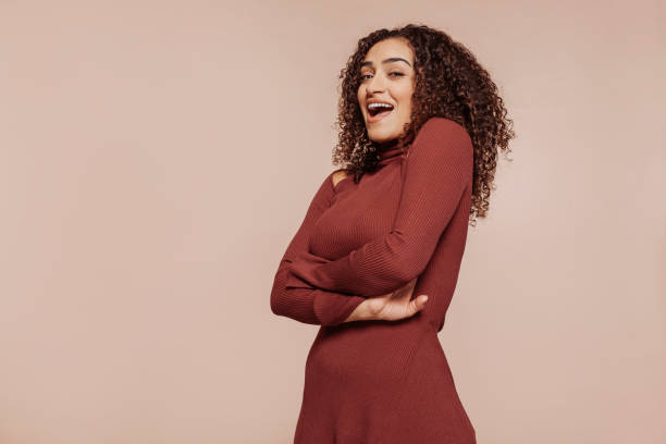 istock Smiling brunette arabic woman posing at studio 1466617447