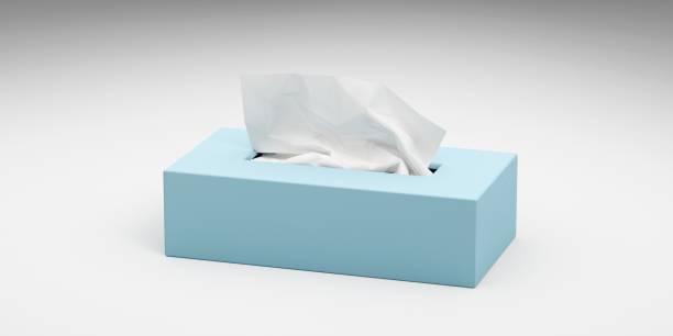 istock 3D rendering of a blue box with paper tissues isolated on white background 1466617564