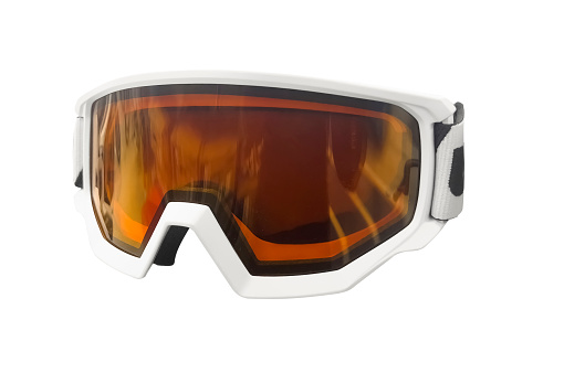 Orange ski snowboard goggles isolated on white background. Ski or snowboarding goggles isolated. Winter sport accessories. Ski mask or glasses