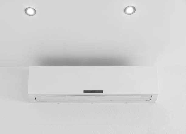 istock Air condition indoor unit compressor in room interior. Split air conditioner machine on the wall. Air compressor. 1466620522