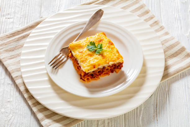 istock Greek Pastitsio on white plate, top view 1466620554