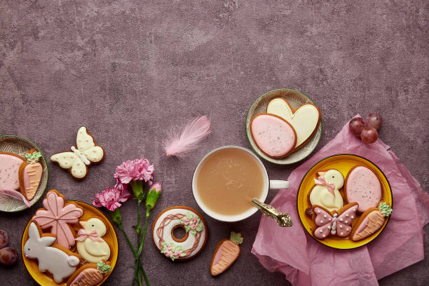 istock Aesthetic Easter background complete coffee cup, decorated cookies, feathers and aster flowers flat lay with copy space. Spring background 1466634326