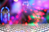 Horizontal shot of Jukebox, disco ball and bokeh composite in the bar