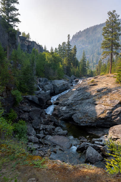istock Vertical shot of river flowing over the rocks 1466635744