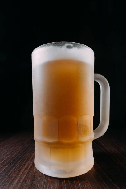istock beer in the jar with black background 1466635806