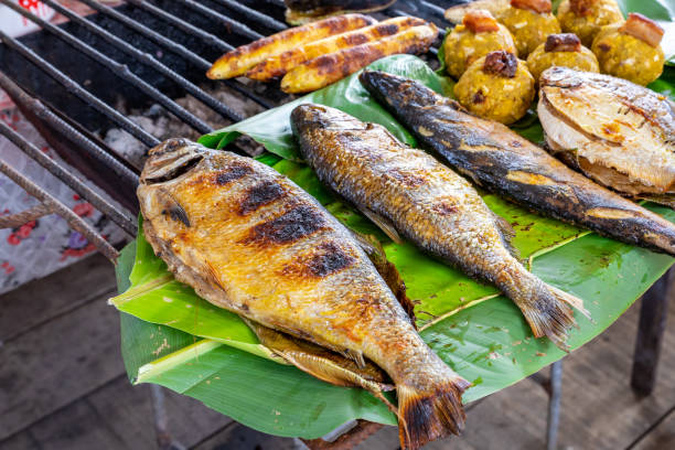 Grilled amazonian fish at the Iquitos market in Loreto. Peru. stock photo