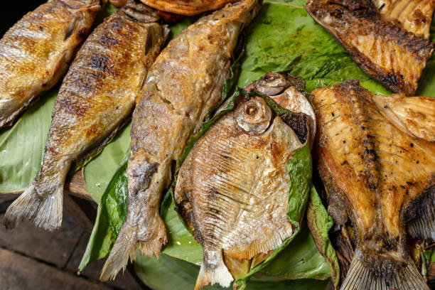 istock Grilled amazonian fish at the Iquitos market in Loreto. Peru. 1466637406