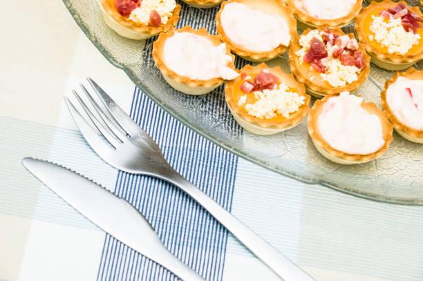 istock Closeup of various canapes with tableware. 1466637489