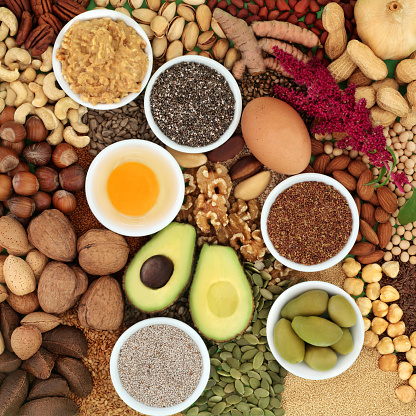Nutritious health food high in essential fatty acids of healthy lipids. Ingredients contain unsaturated fats for healthy heart and cholesterol levels with nuts, dairy, vegetables, seeds, legumes and grain.