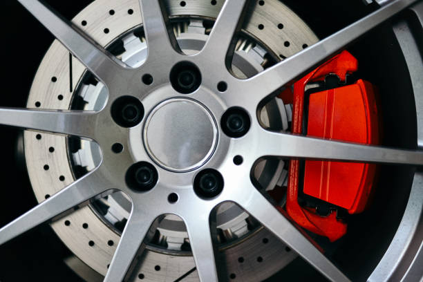 istock Macro shot of a car wheel rim with multiple metallic joints 1466639263