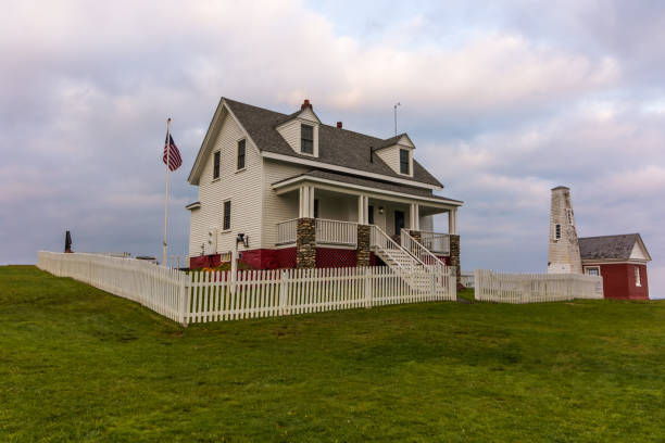 istock Pemaquid Point Lighthouse in Bristol, Maine, at sunset on a summer evening 1466639818